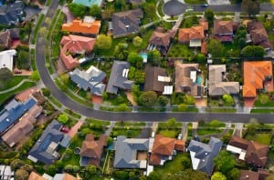 homes in suburban neighbourhood community birds eye view