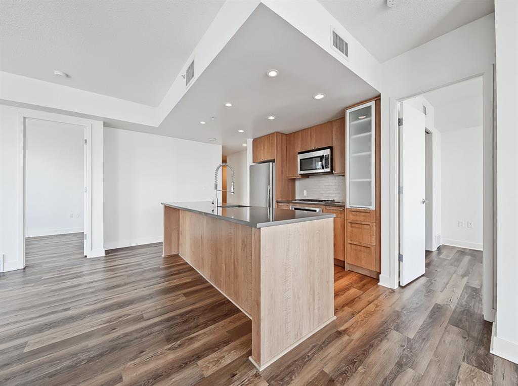 Nova Calgary condos interior kitchen and living room